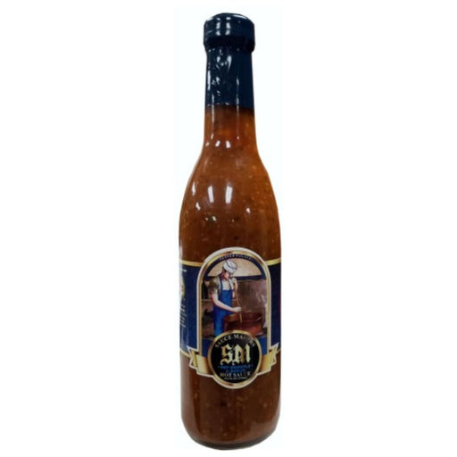 Bottle of hot sauce with a label on a white background