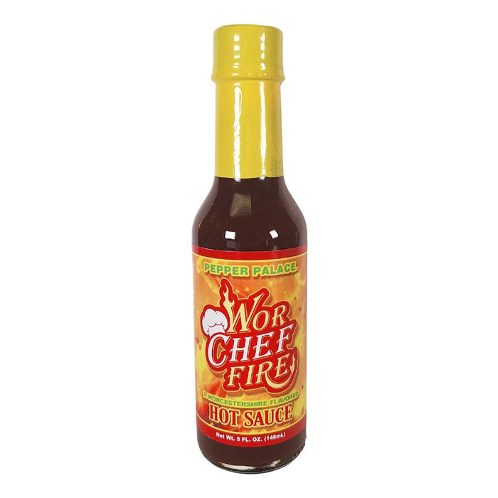 Bottle of Wor Chef Fire hot sauce with a yellow cap on a white background