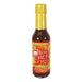 Bottle of Wor Chef Fire hot sauce with a yellow cap on a white background