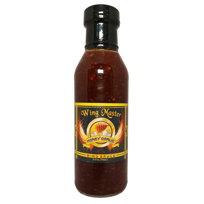 Bottle of Wing Master Honey Garlic Wing Sauce on a white background