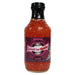 Bottle of Pepper Palace Sweet but Sultry sauce on a white background