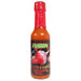 Hot sauce bottle with red cap and black label on a white background