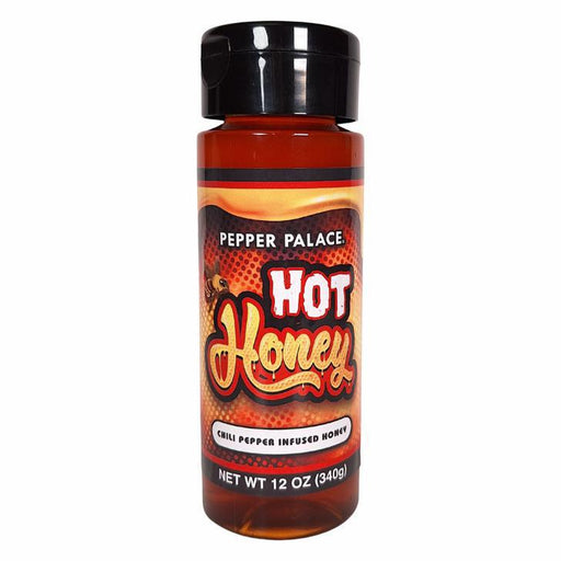 Bottle of Pepper Palace Hot Honey on a white background