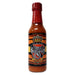 Bottle of Scorpion Garlic hot sauce on a white background