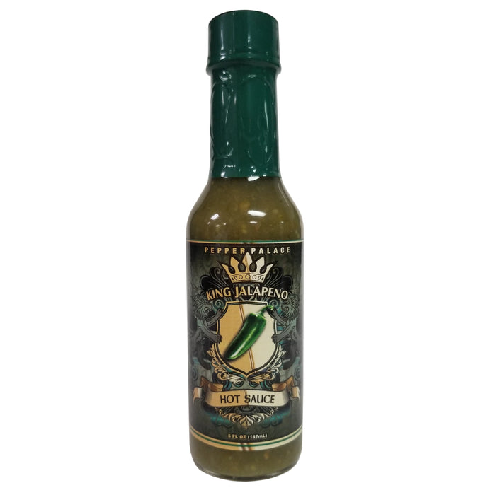 Bottle of King Jalapeno hot sauce with a green cap on a white background