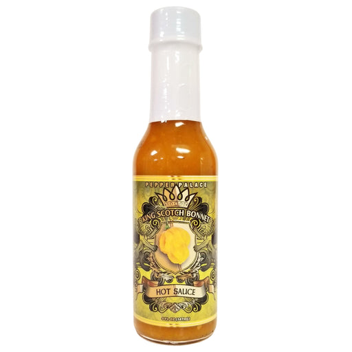 Bottle of hot sauce with a yellow label on a white background