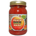 Jar of Peach Mild Salsa with a gold lid on a white background