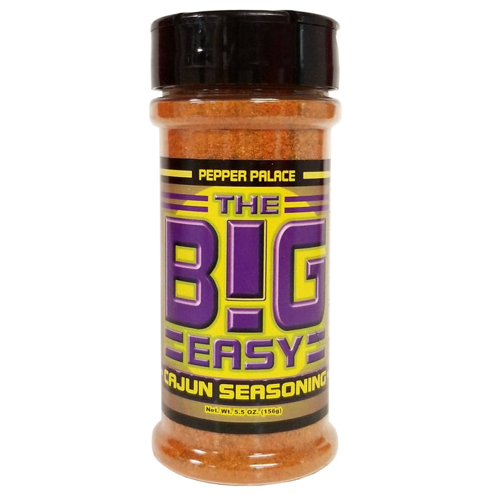 Shaker of 'The Big Easy' Cajun seasoning with colorful label on a white background