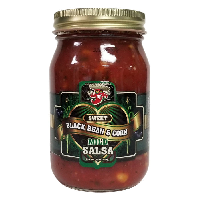 Jar of sweet black bean and corn mild salsa with a gold lid on a white background