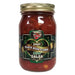 Jar of sweet black bean and corn mild salsa with a gold lid on a white background