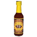 Bottle of Kentucky Charred Chipotle Bourbon Hot Sauce with yellow cap on a white background