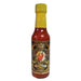 Hot sauce bottle with yellow cap and black label on a white background