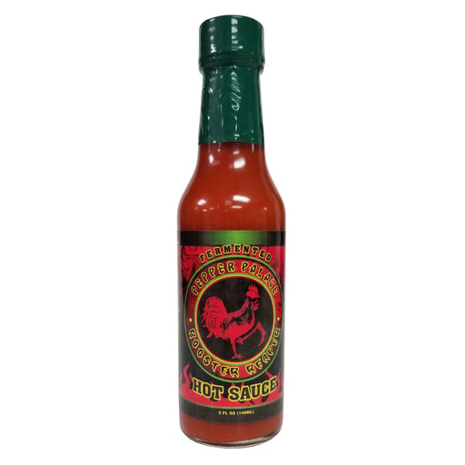 Hot sauce bottle with a red label featuring a rooster on a white background