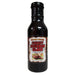 Bottle of Sweet Bourbon Glaze with a label on a white background