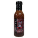Bottle of Asian cooking and dipping sauce with a label on a white background