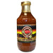 Bottle of Mountain Ghost Pepper X-Hot Barbecue Sauce with a gold cap on a white background
