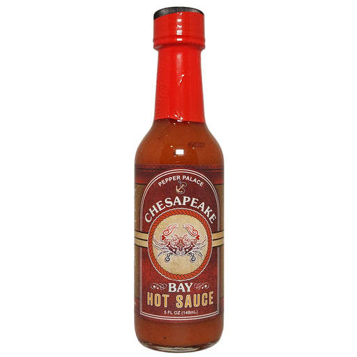 Bottle of Chesapeake Bay Hot Sauce with red cap on a white background