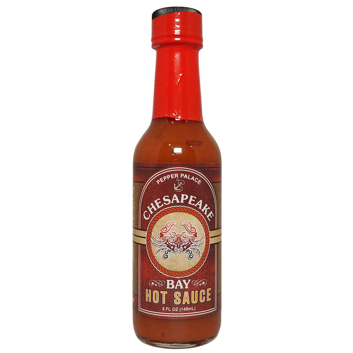 Bottle of Chesapeake Bay Hot Sauce with red cap on a white background