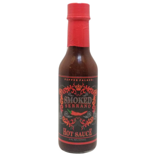 Bottle of Smoked Serrano hot sauce with a red cap on a white background