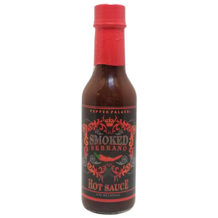 Bottle of Smoked Serrano hot sauce with a red cap on a white background
