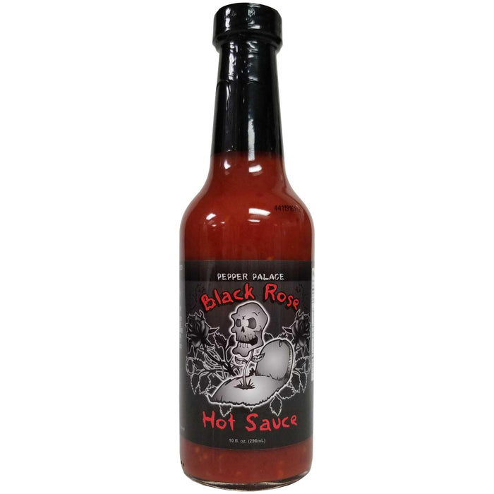 Bottle of Black Rose Hot Sauce with a skull design on a white background