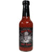 Bottle of Black Rose Hot Sauce with a skull design on a white background
