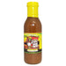 Bottle of 'What A Jerk!' marinade with a colorful label on a white background