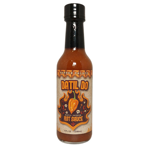 Bottle of Datil Do hot sauce with a black cap on a white background