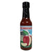 Bottle of Apple Smoked Habanero hot sauce with a colorful label on a white background